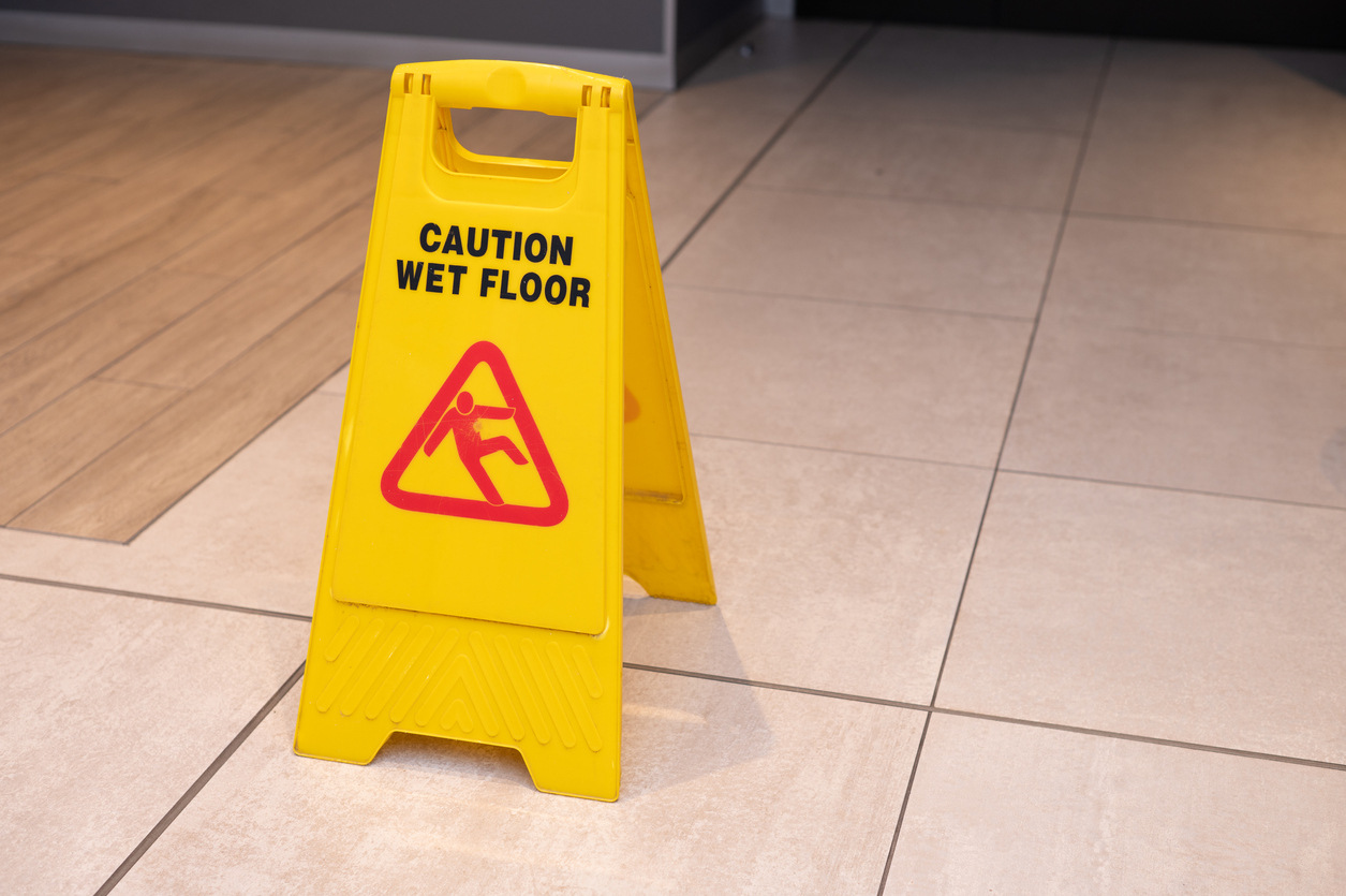 anti slip sign with "caution wet floor"